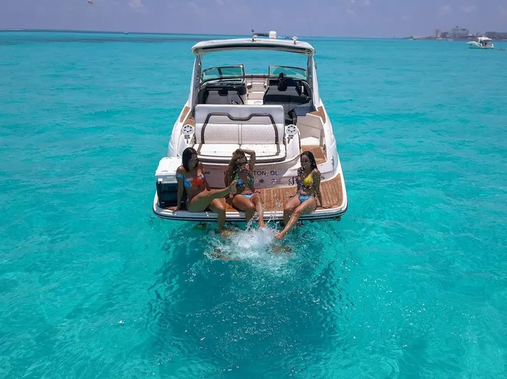  Yacht Photos Pics 2017 Sea Ray 350 SLX with people enjoying turquoise waters.