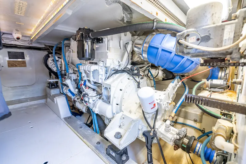Andiamo Yacht Photos Pics Engine room of a 1979 Merritt 46 boat, showcasing detailed machinery and components.