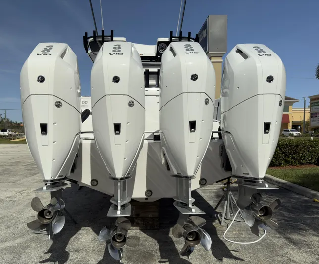 400-102 Yacht Photos Pics 2024 Blackfin 400 CC boat with four powerful outboard engines, rear view.