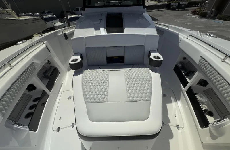 400-102 Yacht Photos Pics 2024 Blackfin 400 CC boat interior with luxurious seating and storage compartments.
