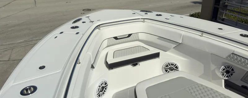 400-102 Yacht Photos Pics 2024 Blackfin 400 CC boat interior with seating and speakers.