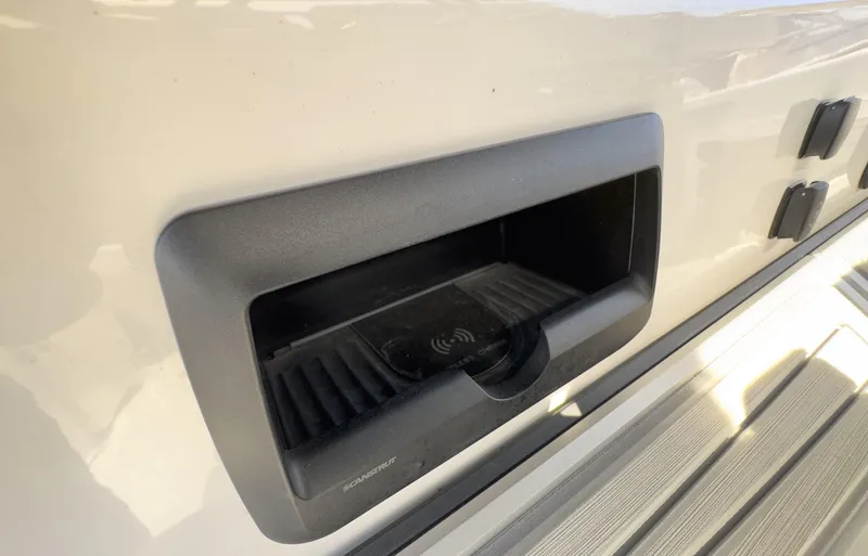 400-102 Yacht Photos Pics 2024 Blackfin 400 CC wireless charging station on boat deck.