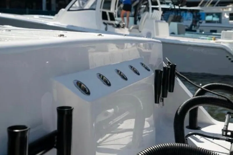  Yacht Photos Pics 2024 Front Runner 37 Catamaran, sleek design with rod holders and modern features.