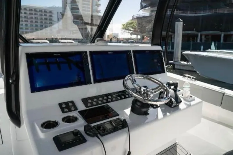  Yacht Photos Pics Control panel of 2024 Front Runner 37 Catamaran with modern navigation displays.