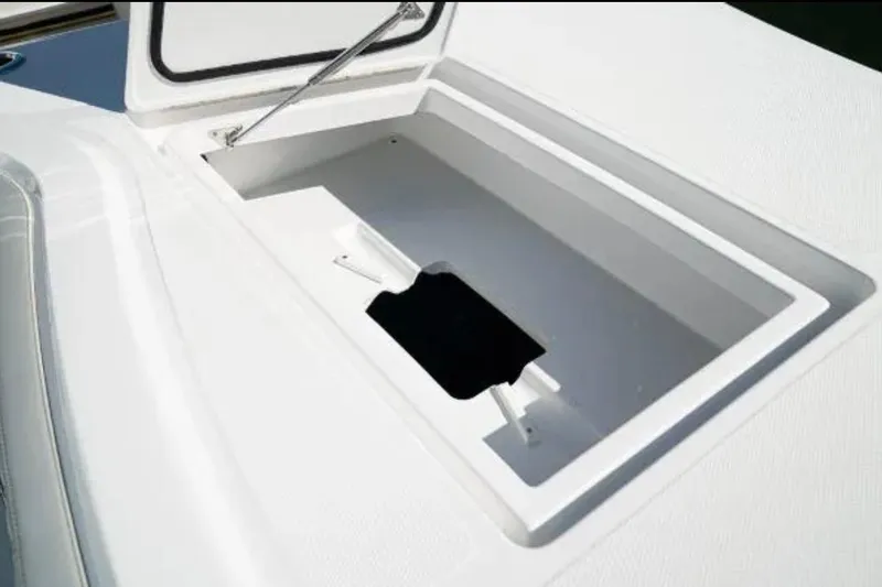  Yacht Photos Pics Open storage compartment on 2024 Front Runner 37 Catamaran deck.