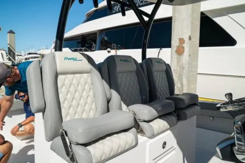  Yacht Photos Pics Luxury seating on 2024 Front Runner 37 Catamaran, featuring diamond-stitched upholstery.