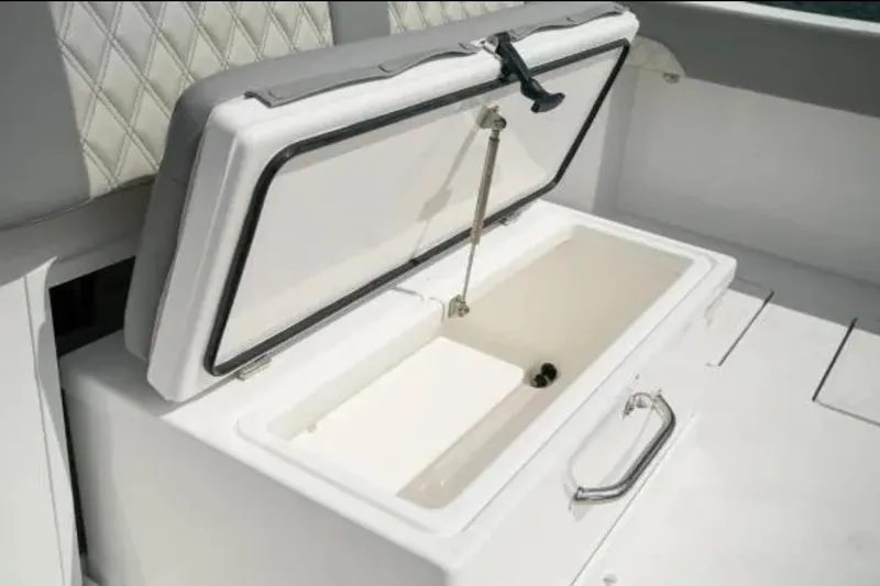  Yacht Photos Pics Open storage compartment on 2024 Front Runner 37 Catamaran boat interior.