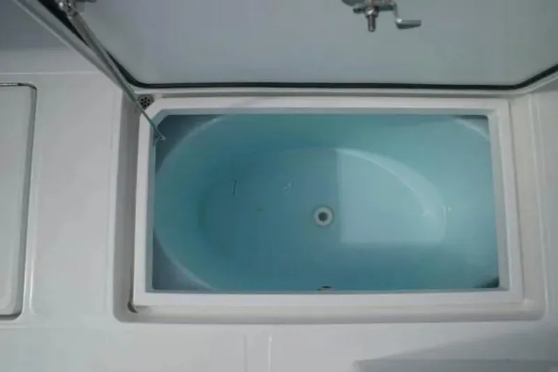  Yacht Photos Pics Livewell on 2024 Front Runner 37 Catamaran, featuring a clean, white design.