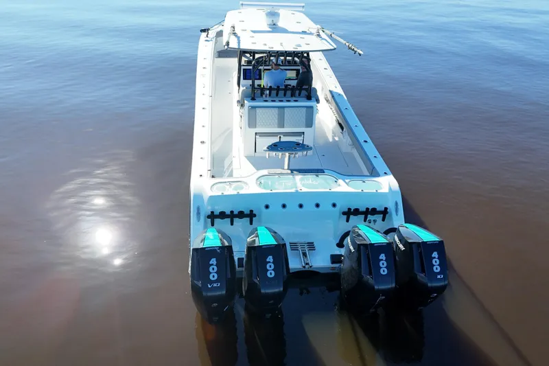  Yacht Photos Pics 2024 Front Runner 37 Catamaran with quad 400 horsepower engines on calm water.