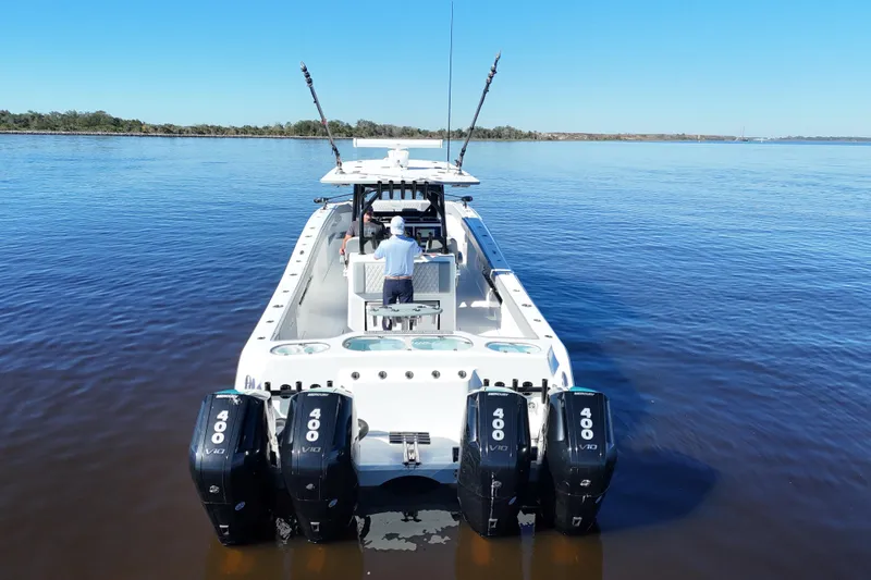  Yacht Photos Pics 2024 Front Runner 37 Catamaran with quad 400 engines on calm water.