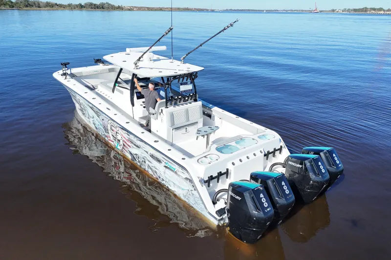  Yacht Photos Pics 2024 Front Runner 37 Catamaran with quad Mercury 400 engines on calm water.