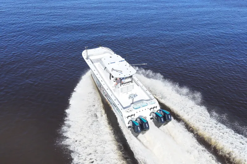  Yacht Photos Pics 2024 Front Runner 37 Catamaran cruising on open water, aerial view.