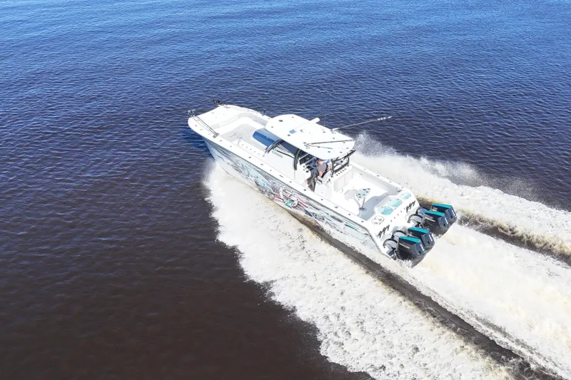  Yacht Photos Pics 2024 Front Runner 37 Catamaran cruising on open water, aerial view.