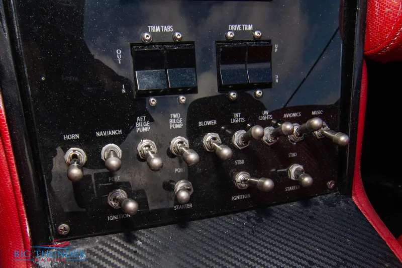  Yacht Photos Pics Control panel of a 2009 Donzi 38 ZRC boat with various switches and indicators.