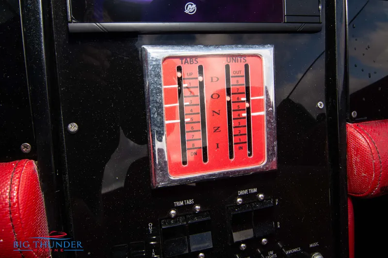  Yacht Photos Pics Control panel of a 2009 Donzi 38 ZRC boat with trim tabs and drive trim.