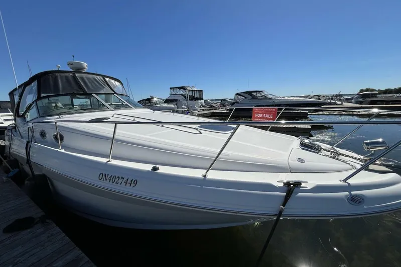  Yacht Photos Pics 2007 Sea Ray 340 Sundancer boat docked, for sale sign visible.