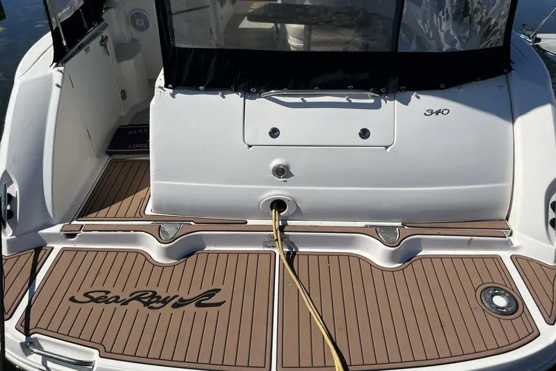  Yacht Photos Pics 2007 Sea Ray 340 Sundancer boat deck with logo and teak flooring.