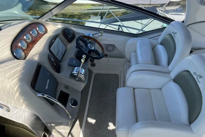  Yacht Photos Pics Helm of 2007 Sea Ray 340 Sundancer with dual seats and modern controls.