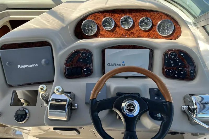  Yacht Photos Pics 2007 Sea Ray 340 Sundancer helm with Raymarine and Garmin navigation systems.