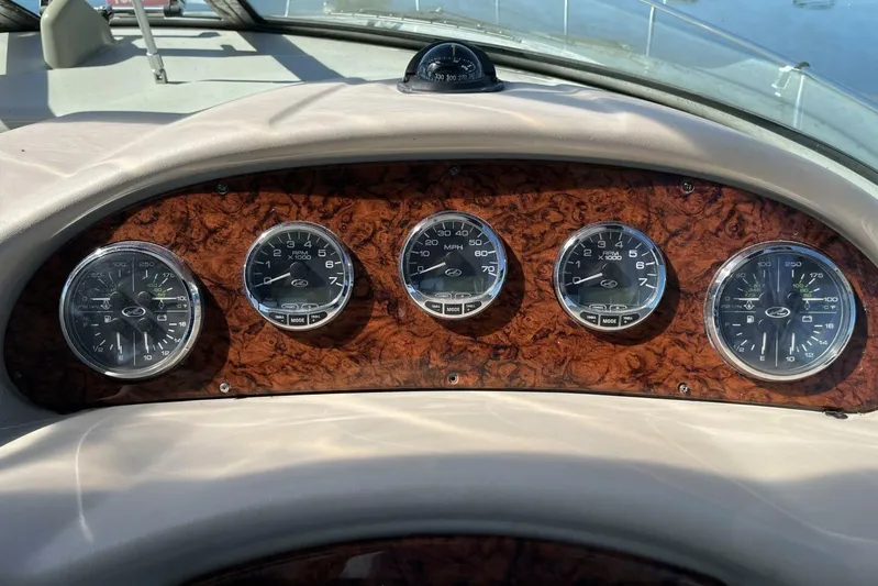  Yacht Photos Pics Dashboard of 2007 Sea Ray 340 Sundancer with wood finish and analog gauges.