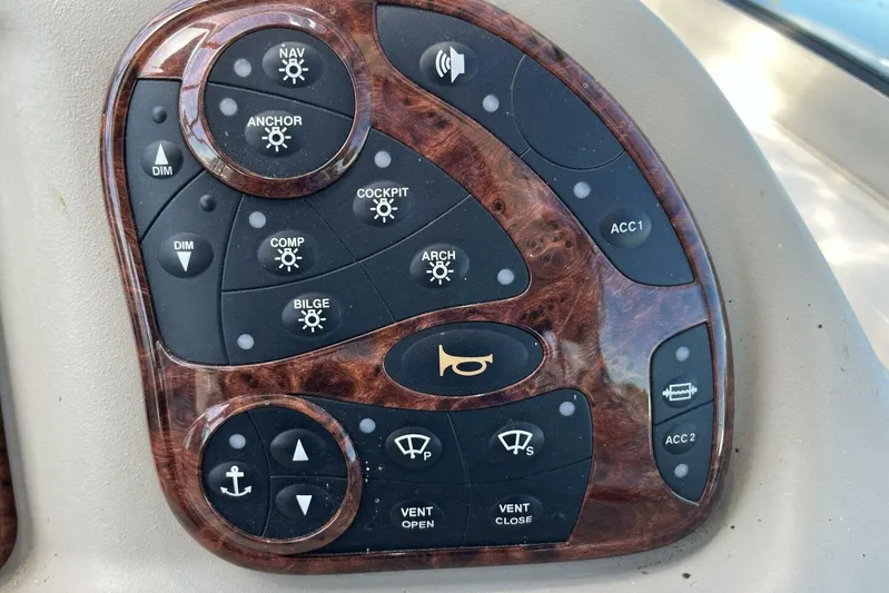  Yacht Photos Pics Control panel of a 2007 Sea Ray 340 Sundancer boat with various function buttons.