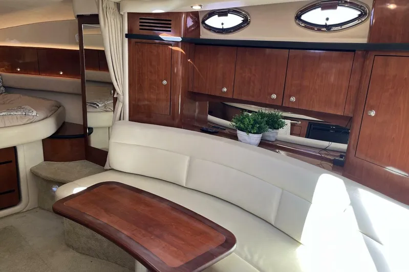  Yacht Photos Pics Luxurious interior of 2007 Sea Ray 340 Sundancer yacht with elegant wood cabinetry.