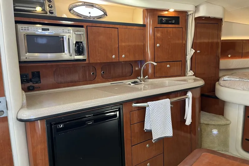  Yacht Photos Pics Luxurious 2007 Sea Ray 340 Sundancer yacht interior with modern kitchen amenities.