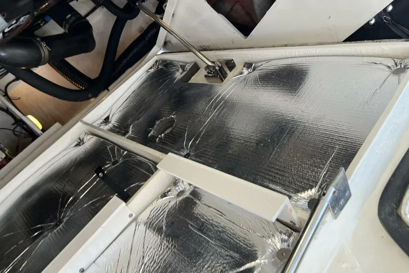  Yacht Photos Pics Engine compartment of a 2007 Sea Ray 340 Sundancer with reflective insulation panels.