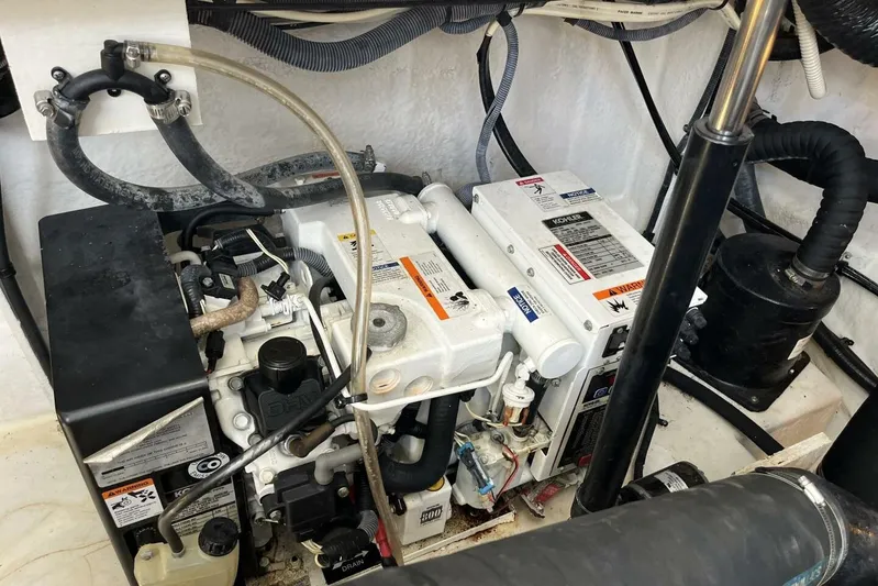  Yacht Photos Pics Engine compartment of a 2007 Sea Ray 340 Sundancer boat, showing mechanical components.