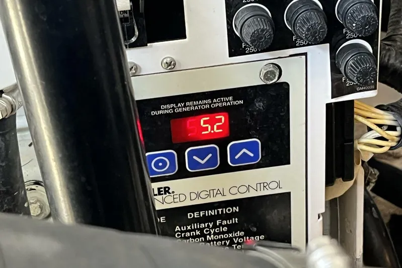  Yacht Photos Pics Control panel of a 2007 Sea Ray 340 Sundancer displaying 5.2 on digital screen.