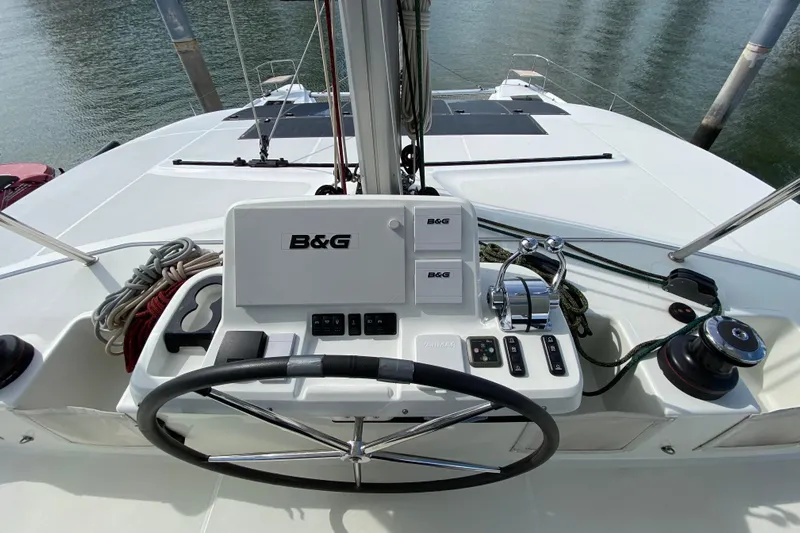  Yacht Photos Pics Helm of 2022 Lagoon 50 catamaran with B&G navigation system and steering wheel.