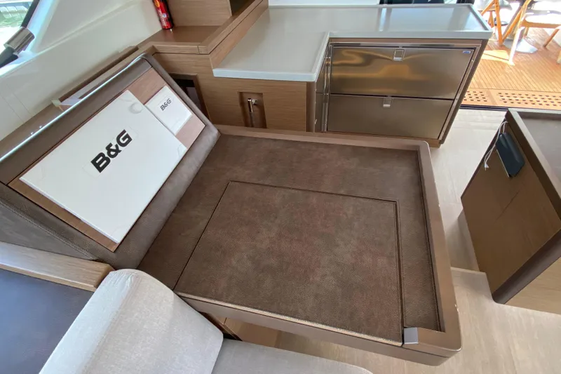  Yacht Photos Pics Interior of 2022 Lagoon 50 yacht with B&G navigation equipment and modern cabinetry.