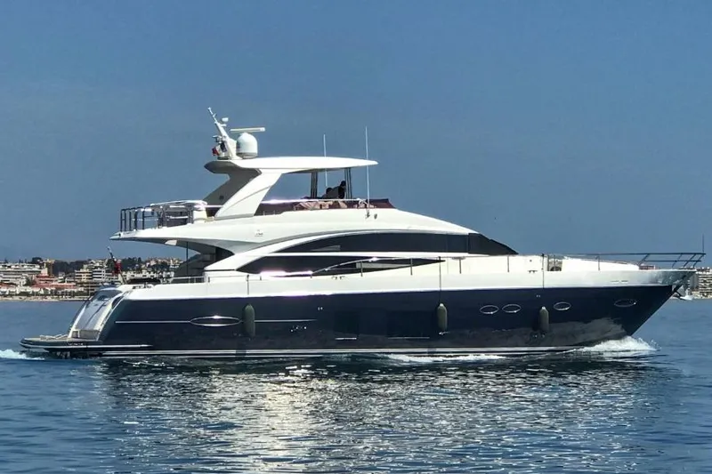  Yacht Photos Pics Luxury 2011 Princess 72 yacht cruising on calm blue waters.