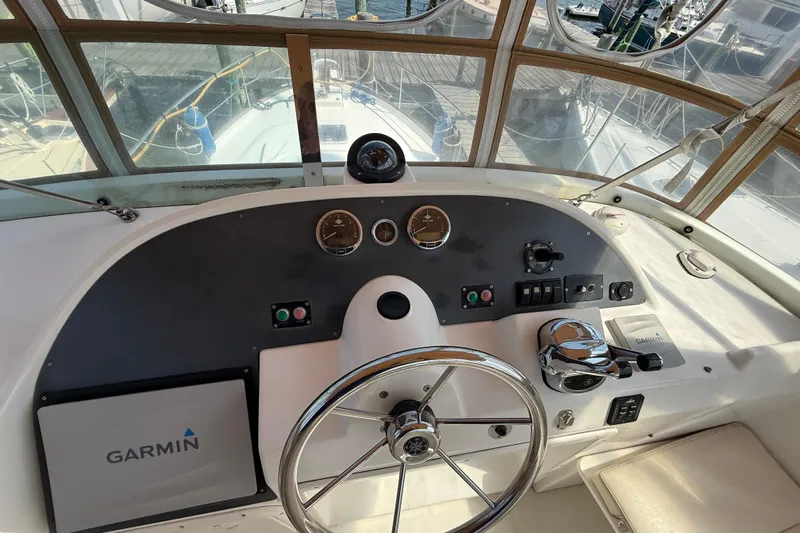 All At Sea Yacht Photos Pics Helm of 2007 Beneteau Swift Trawler 42 with Garmin navigation system.