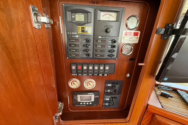 All At Sea Yacht Photos Pics Electrical control panel on a 2007 Beneteau Swift Trawler 42 boat.