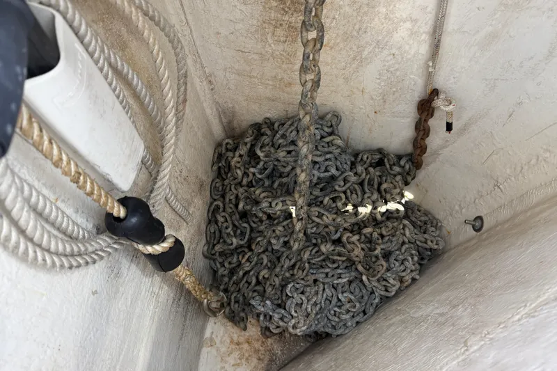 All At Sea Yacht Photos Pics Anchor chain and ropes in a 2007 Beneteau Swift Trawler 42 storage compartment.