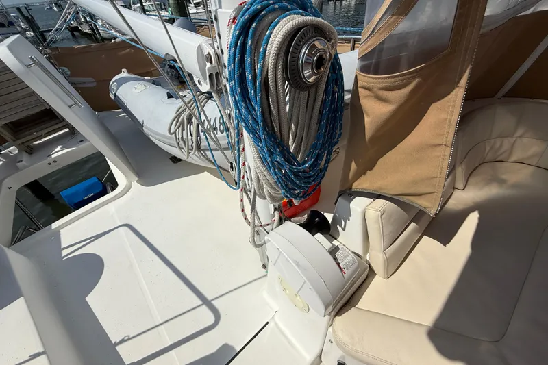 All At Sea Yacht Photos Pics 2007 Beneteau Swift Trawler 42 deck with ropes and seating area.