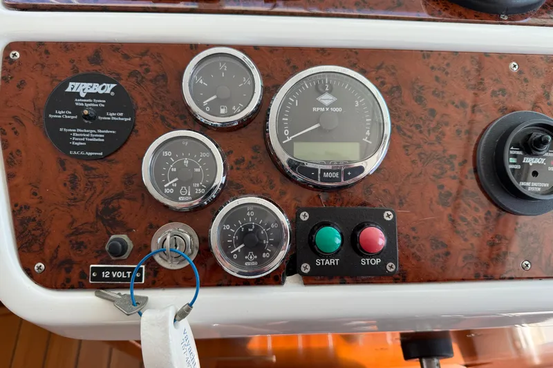 All At Sea Yacht Photos Pics Control panel of a 2007 Beneteau Swift Trawler 42 with gauges and ignition.