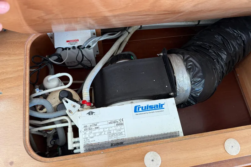 All At Sea Yacht Photos Pics Cruisair air conditioning unit in 2007 Beneteau Swift Trawler 42 engine compartment.