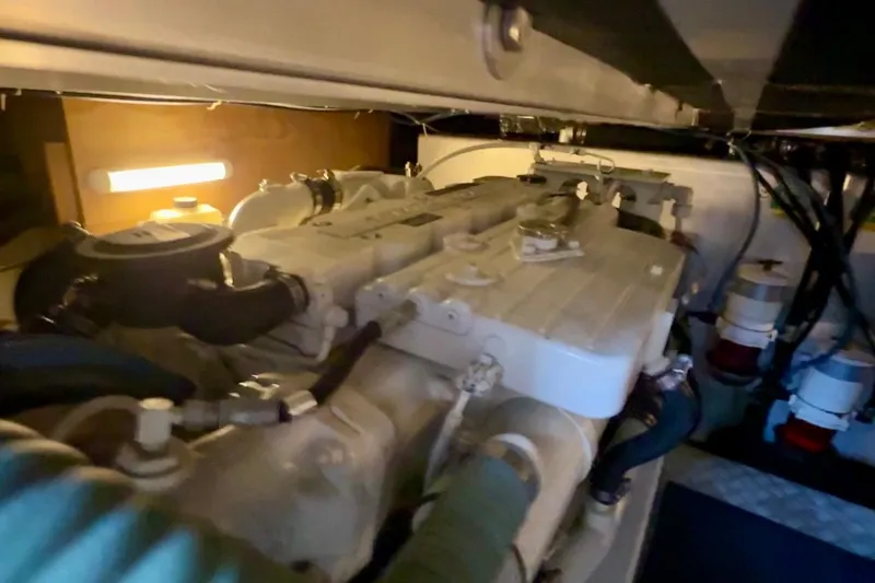 All At Sea Yacht Photos Pics Engine room of 2007 Beneteau Swift Trawler 42, showcasing mechanical components.