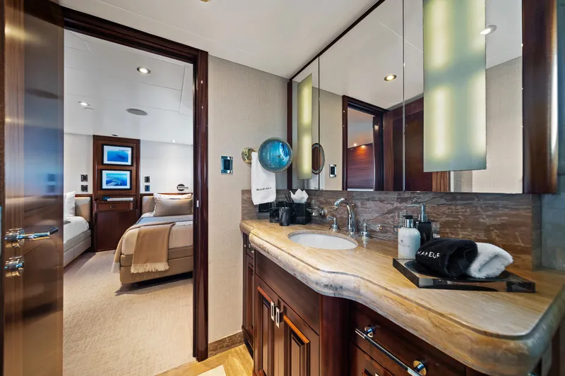 Rule No. 1 Yacht Photos Pics Luxurious bathroom and bedroom interior of 2011 Westport 40-meter yacht.