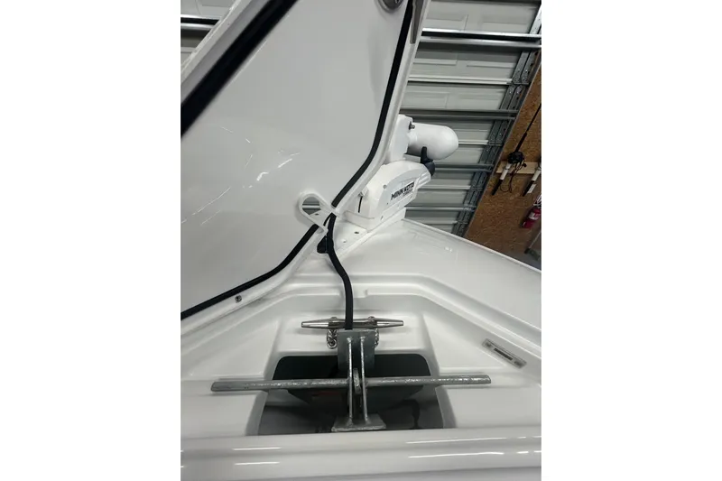  Yacht Photos Pics 2024 Contender 24 Sport boat anchor compartment with Minn Kota trolling motor.