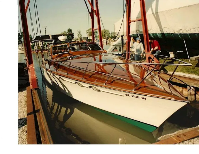 Sea Fox Run Yacht Photos Pics Classic 1990 Mays Craft 44 boat with polished wood finish in a marina setting.