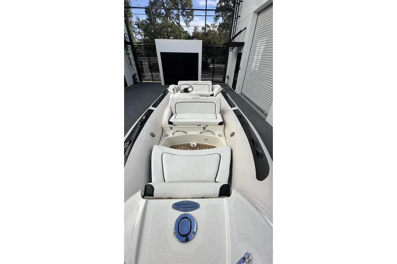 Compass Rose Yacht Photos Pics Custom 1995 Heisley boat interior with white seating and modern design.