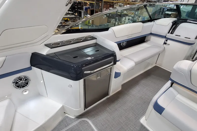  Yacht Photos Pics 2020 Formula 310 Bowrider interior with sleek seating and modern amenities.