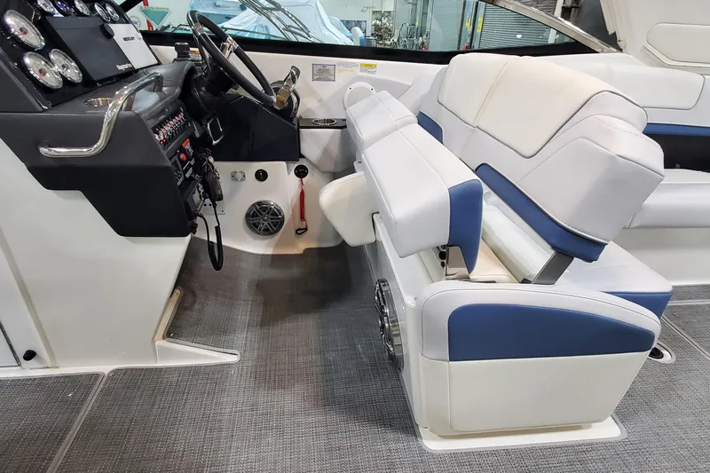  Yacht Photos Pics 2020 Formula 310 Bowrider cockpit with modern controls and comfortable seating.