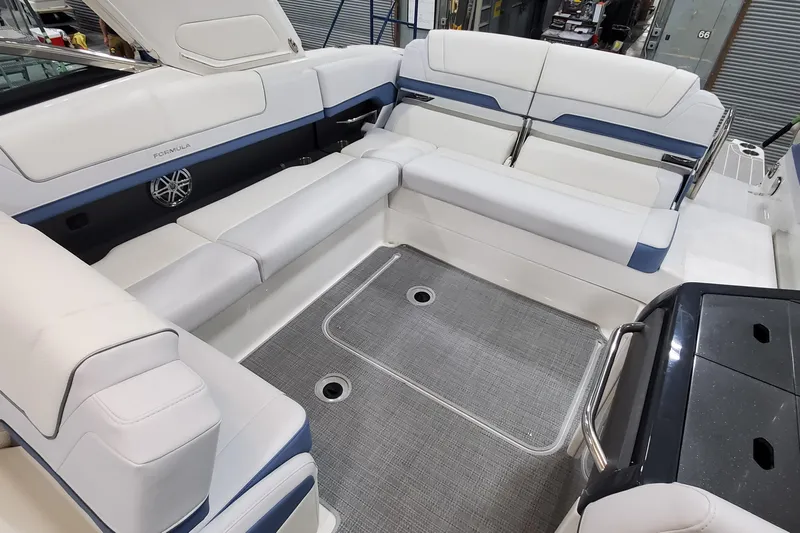  Yacht Photos Pics 2020 Formula 310 Bowrider interior with spacious seating and modern design.
