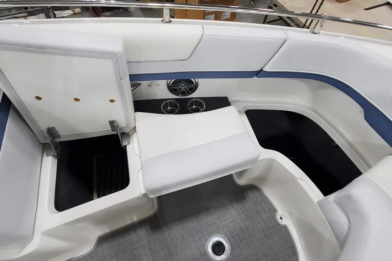  Yacht Photos Pics 2020 Formula 310 Bowrider interior with white seating and cup holders.