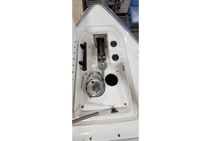  Yacht Photos Pics 2020 Formula 310 Bowrider anchor compartment with winch and controls.