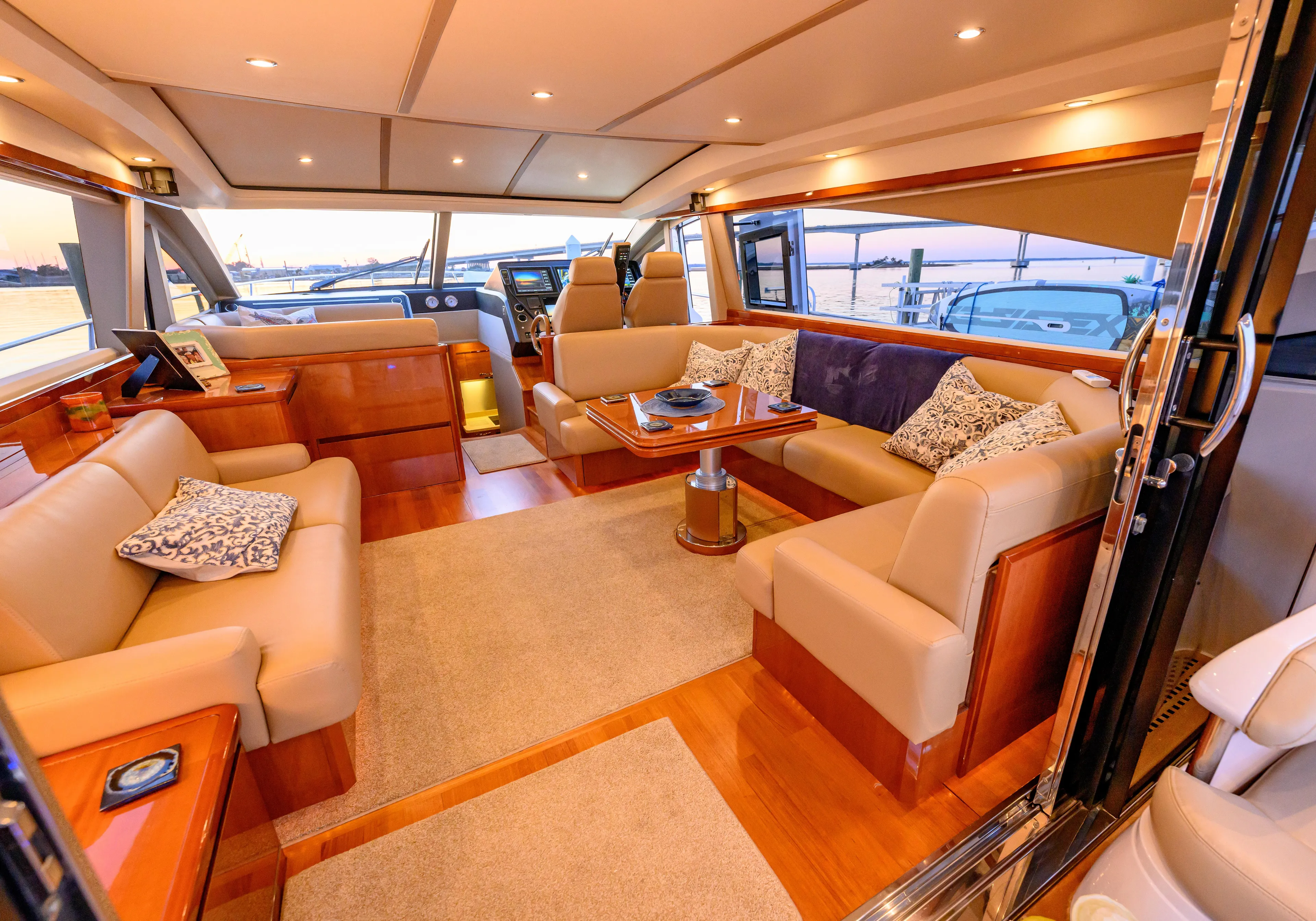 Endless Summer Yacht Photos Pics Luxurious interior of a 2006 Princess V65 yacht with elegant seating and decor.